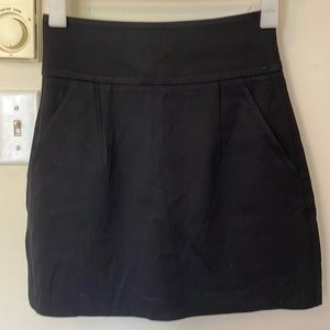 Black mini theory skirt